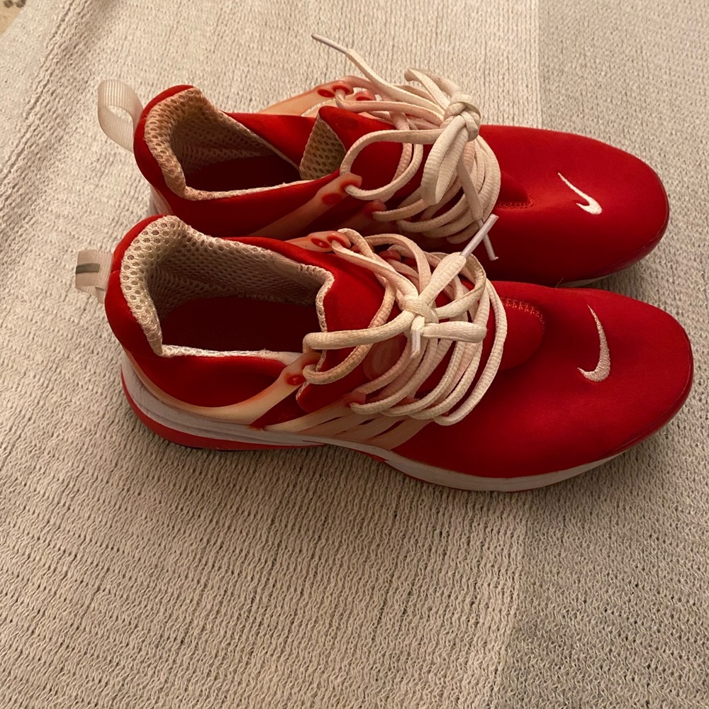 Worn Nike running shoe size 8
